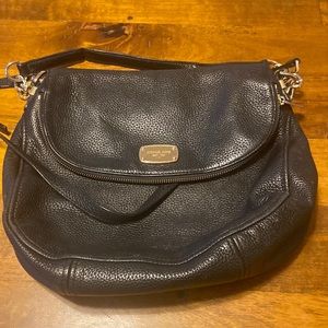 Michael Kor’s soft leather purse. Black.